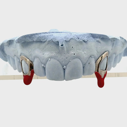 Partial Enamel Grillz with red enamel drip fangs